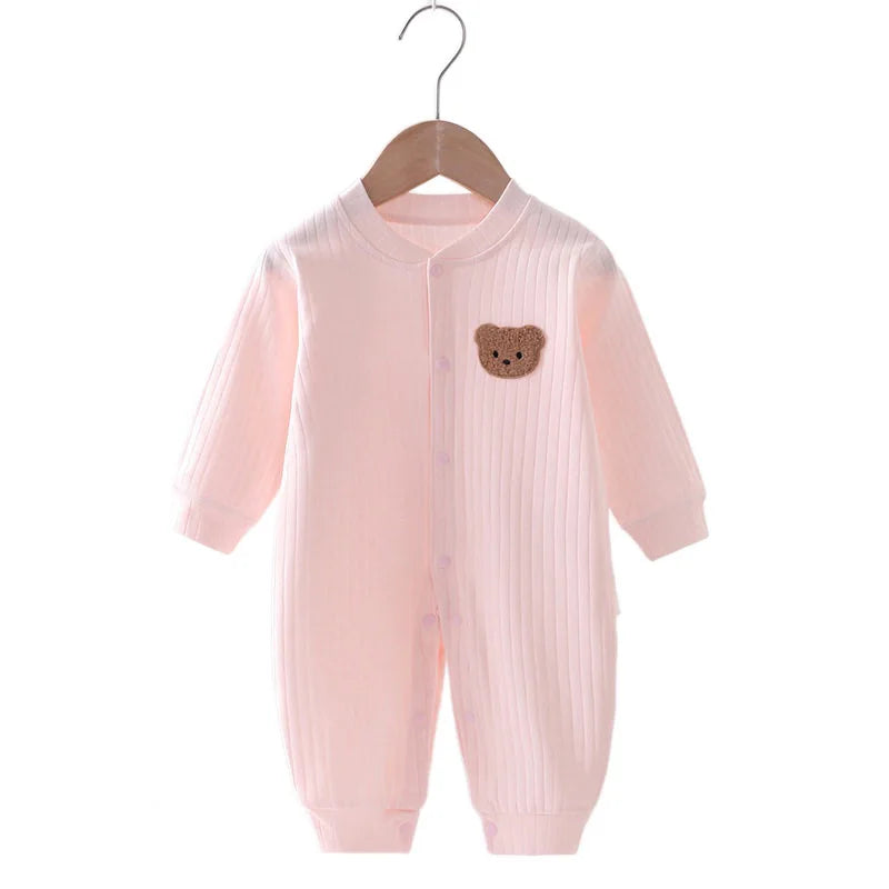 Pink baby romper onesie with embroidered bear design, made from soft 100% polyester fabric, featuring long-sleeve and a cozy, stylish fit for babies