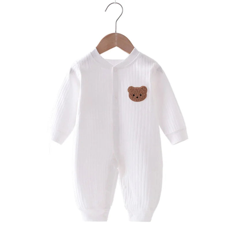 White baby romper onesie with embroidered bear design, made from soft 100% polyester fabric, featuring long-sleeve and a cozy, stylish fit for babies