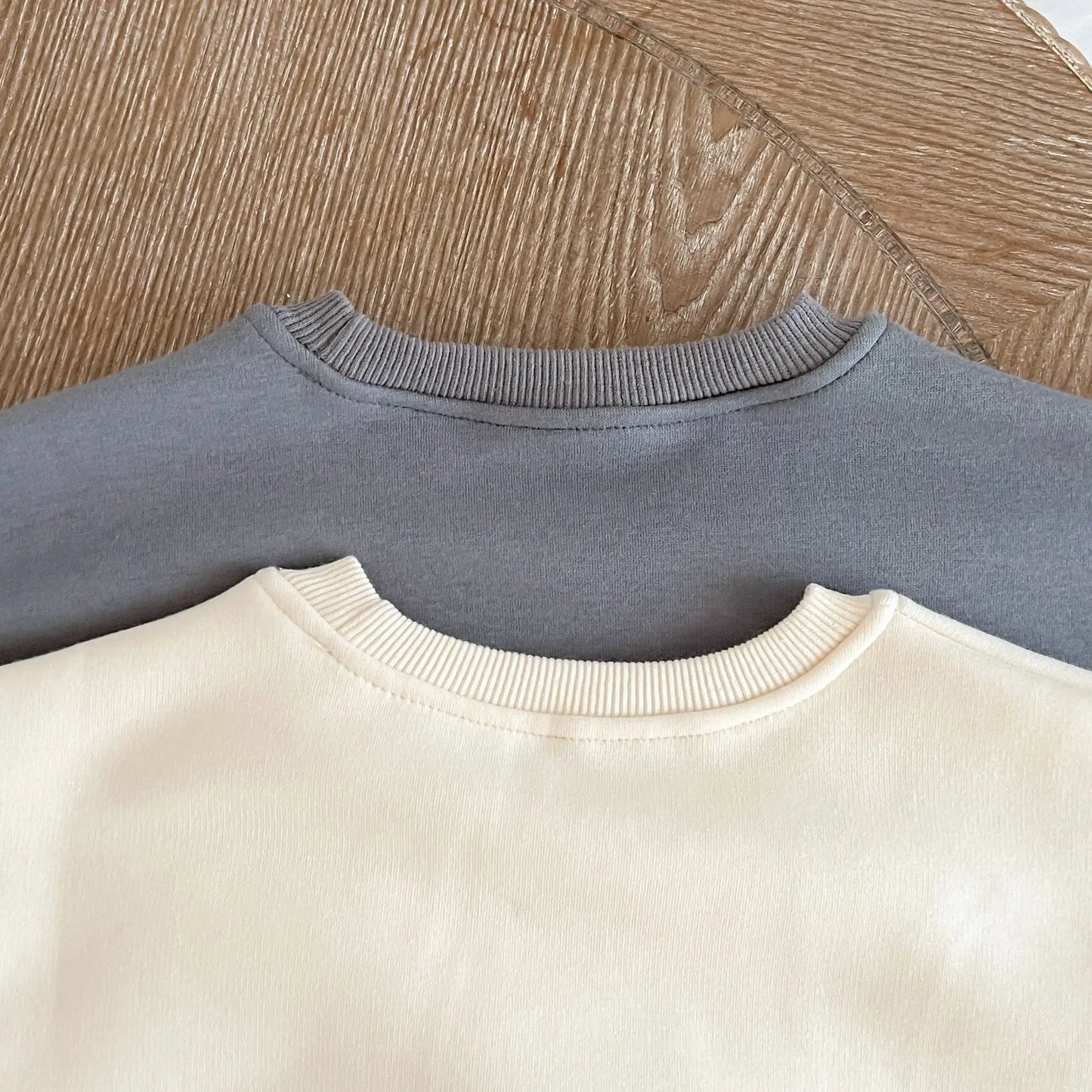 Baby Dinos Sweatshirt Bodysuit in Apricot