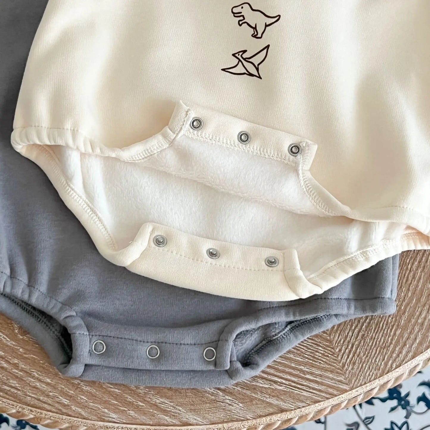 Baby Dinos Sweatshirt Bodysuit in Apricot