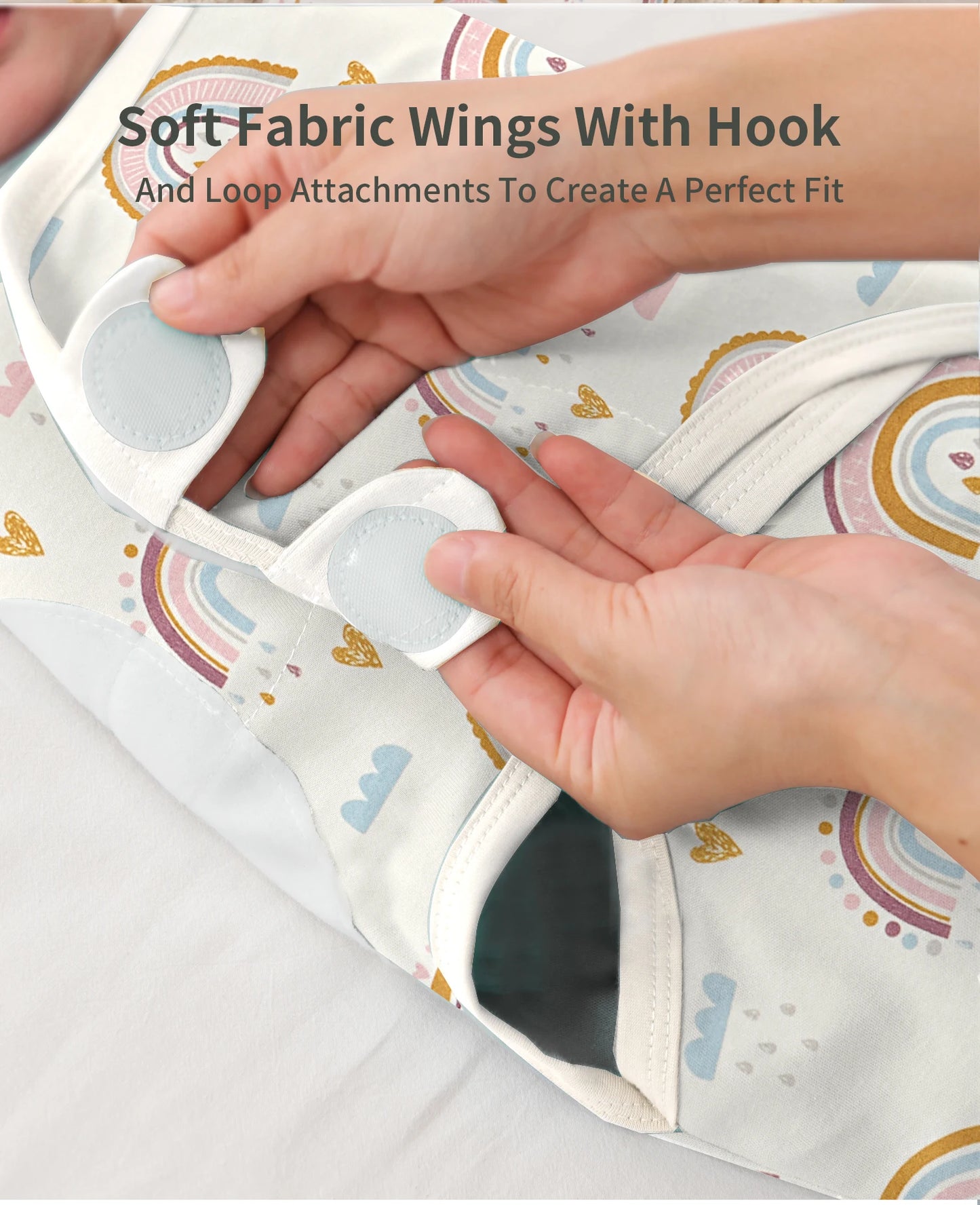 Featuring Newborn Sleep Swaddle in Rainbow