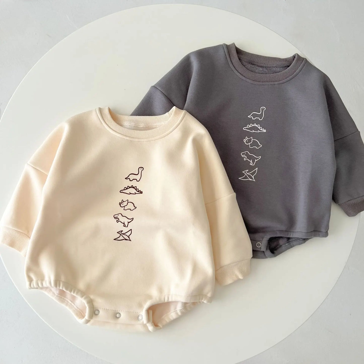 Baby Dinos Sweatshirt Bodysuit in Apricot